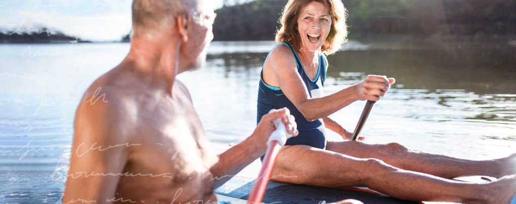 Couple paddle boarding