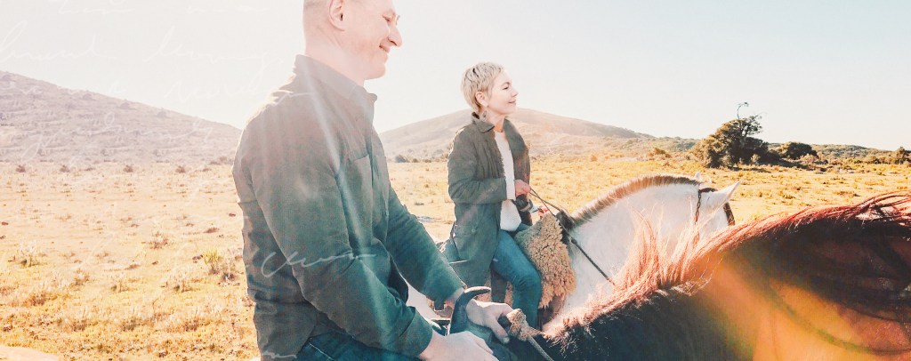 Couple horseback riding
