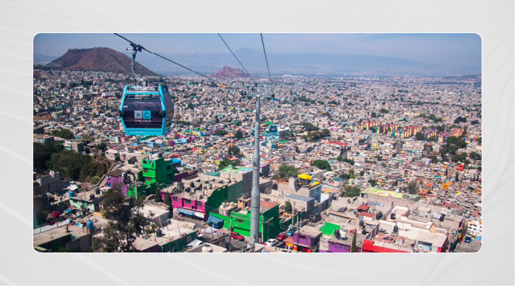 birds eye view of Mexico City neighborhood, Iztapalapa showing colorful murals and buildings.
